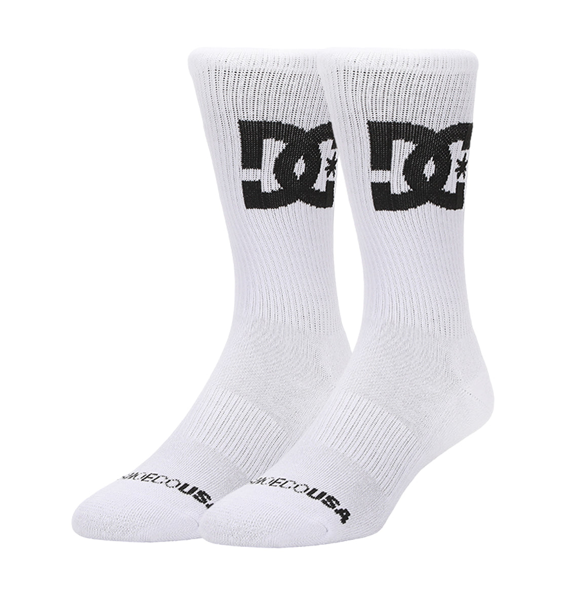 A 3-pack of DC Shoes Big Star Logo crew socks in white, each featuring a bold black DC logo on the sides and "DC SHOES USA" text on the toes, displayed upright against a plain white background.