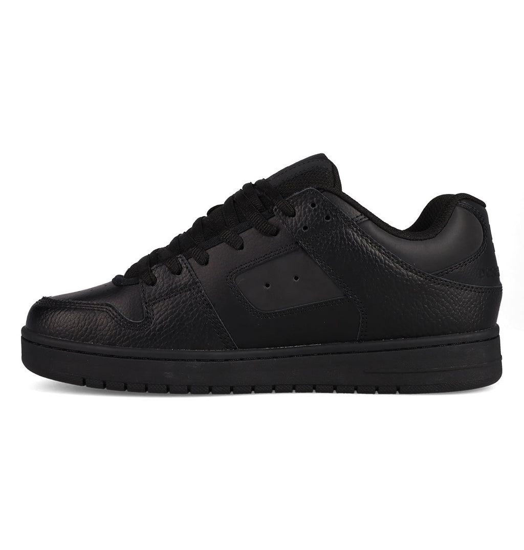 A black low-top sneaker with a textured leather upper, black laces, and a flat black sole, the Men’s Manteca 4 SE Shoes by DC Shoes showcase a performance-inspired design. Displayed in side profile against a white background.