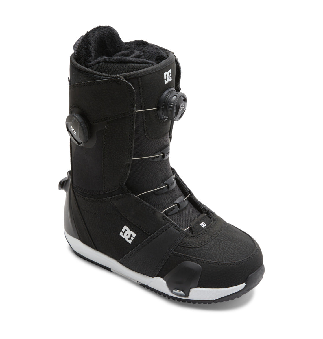 A black Women’s Lotus Step On® Snowboard Boot by DC Shoes, featuring the Dual Zone BOA Fit System, DC Shoes logos on the side and front, and a textured sole for grip.