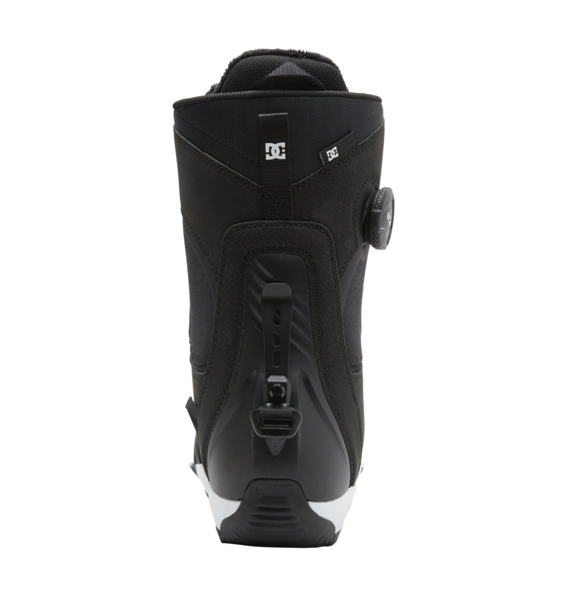 Rear view of the DC Shoes Women’s Lotus Step On® Snowboard Boots in black, highlighting the Dual Zone BOA Fit System with a side-mounted dial adjustment, heel strap, and DC logo near the top. The boots are displayed on a white background.