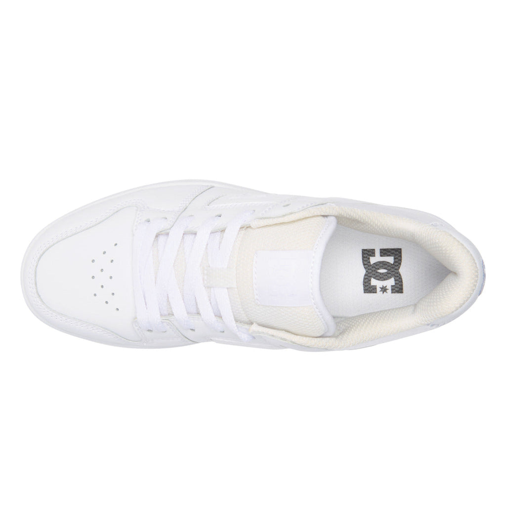 Top view of a white Women’s Manteca 4 Platform Shoe by DC Shoes, showcasing white laces and a perforated toe box, with the DC logo visible on the inner sole. This stylish sneaker is part of the DC Shoes Women’s Manteca 4 Platform Shoes collection—ideal for anyone searching for trendy women’s platform footwear with iconic DC style.