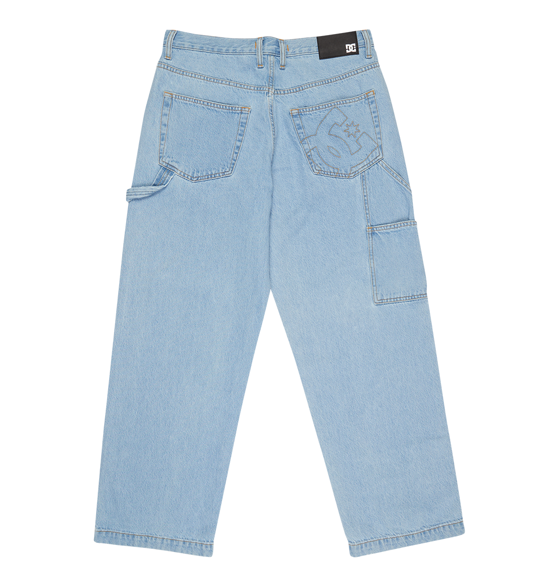 Men's Baggy Denim Carpenter Pant by DC Shoes shown flat from the back, with two large back pockets, a black brand patch on the waistband, side utility pockets, and visible stitching details on heavyweight light blue denim.