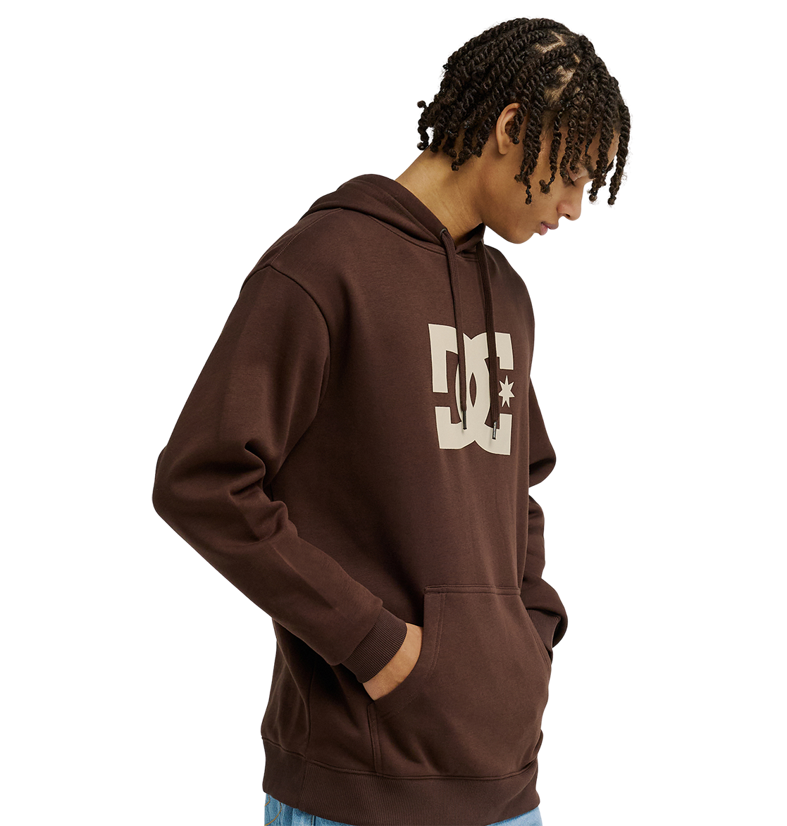 A person wears the men's DC Star Hoodie by DC Shoes—a brown pullover with large white DC graphics on the chest—standing with hands in the front pocket against a plain white background.